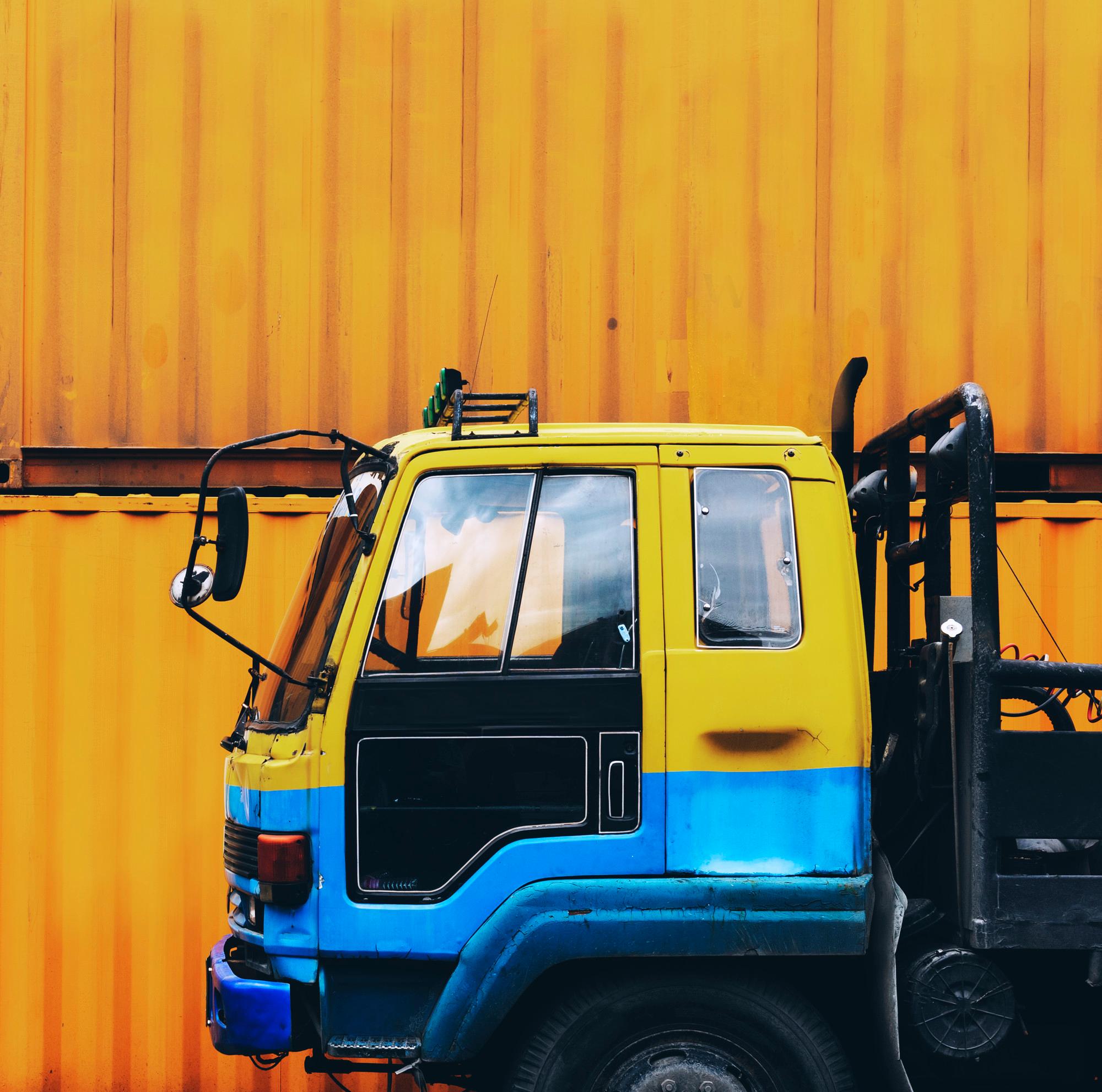 Yellow and blue service truck